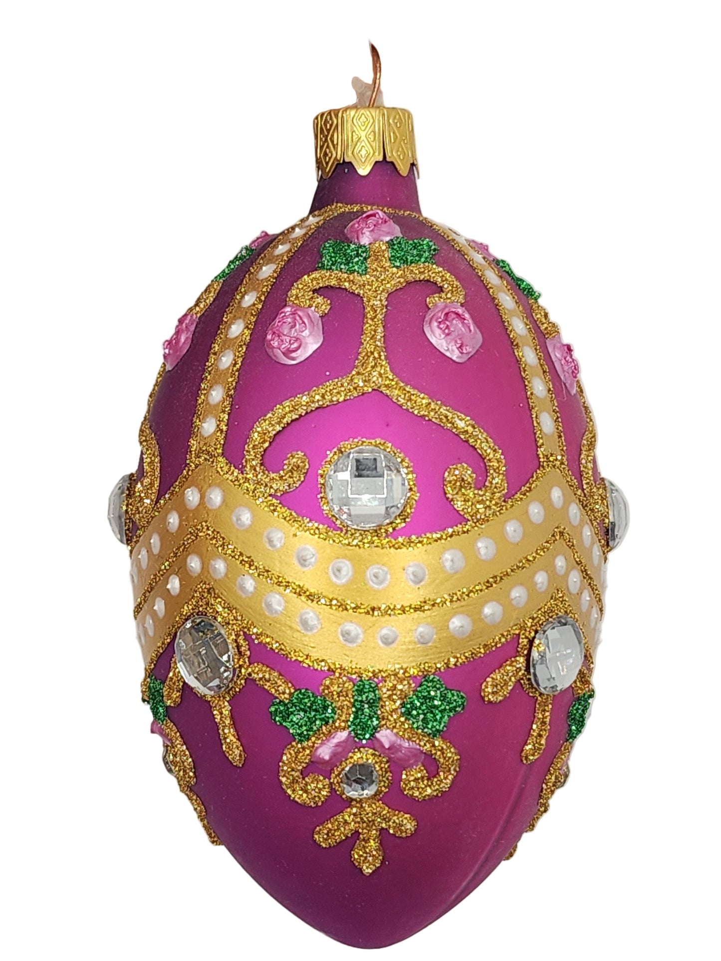 Decorative egg with pink, gold, and green colors on a white background