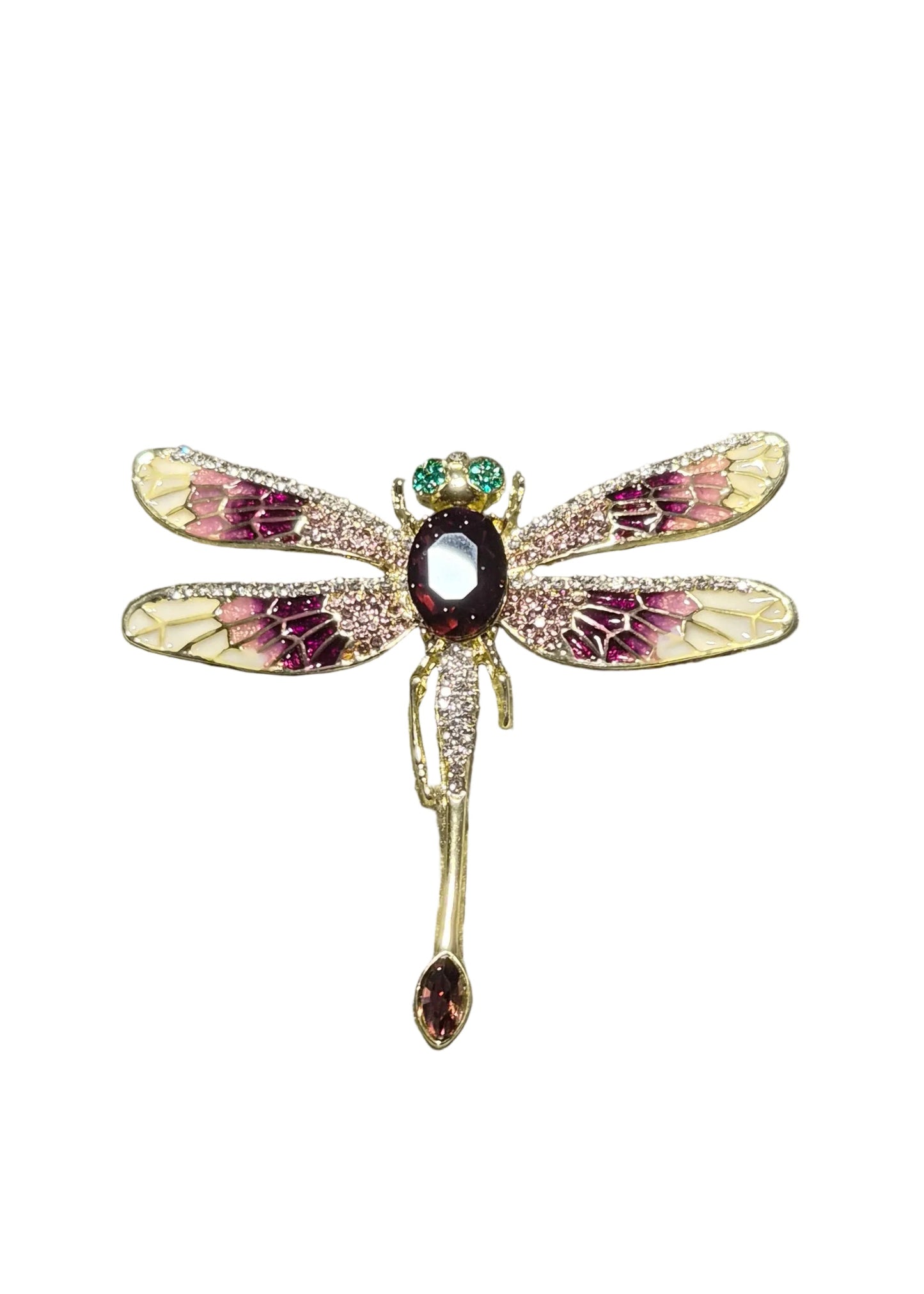 A gold dragonfly brooch with pink and purple enamel wings, a dark red center stone, and green accents.