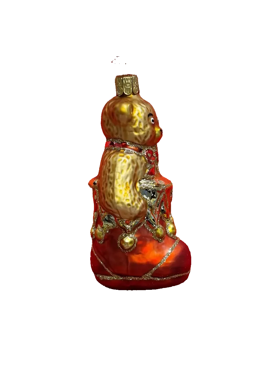 European Glass Christmas ornament of a teddy bear in a red stocking from the side