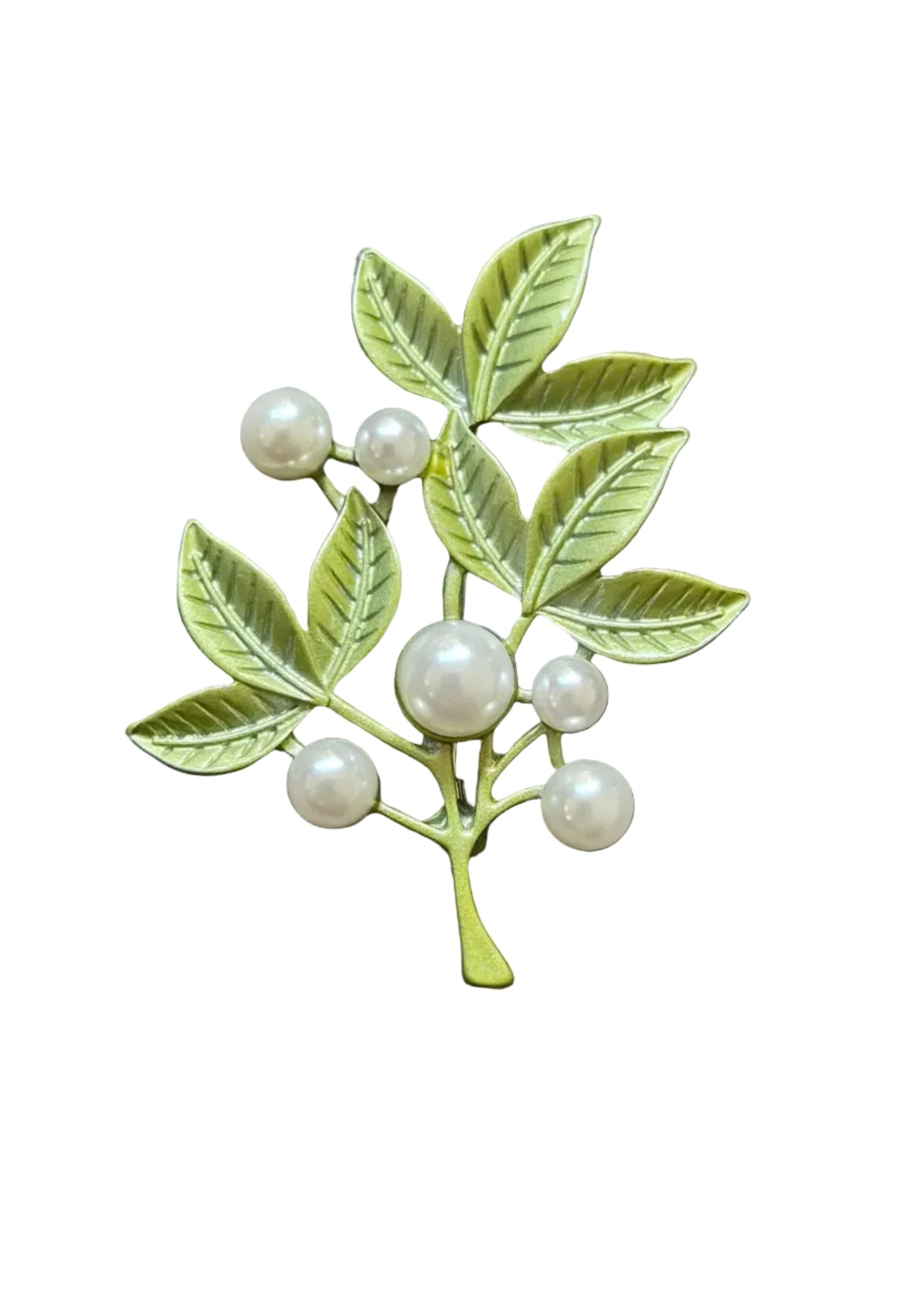 A decorative brooch shaped like a leafy branch with faux pearls.