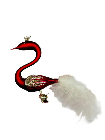 Red and white decorative item resembling a swan 