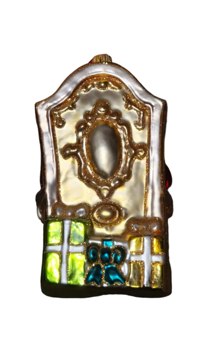 Decorative European handmade glass Christmas ornament of a Santa sitting on a golden throne