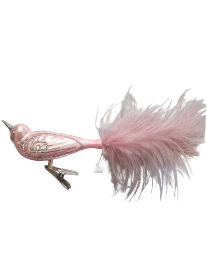 pink bird-shaped christmas ornament with feathers 