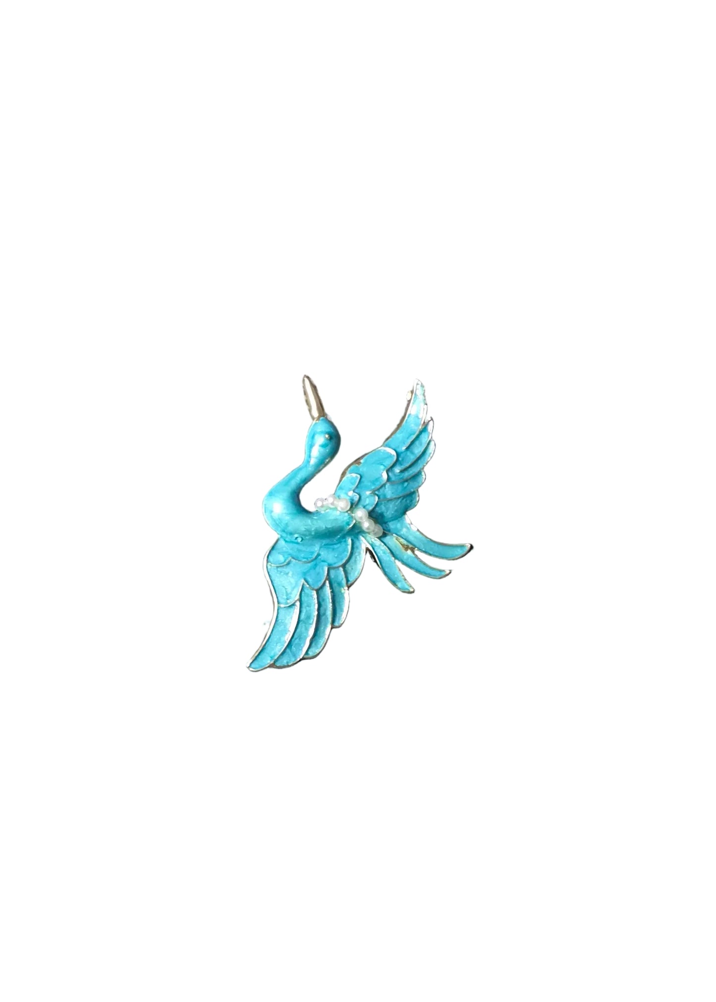 A small turquoise-blue bird brooch with silver-toned metal outlines