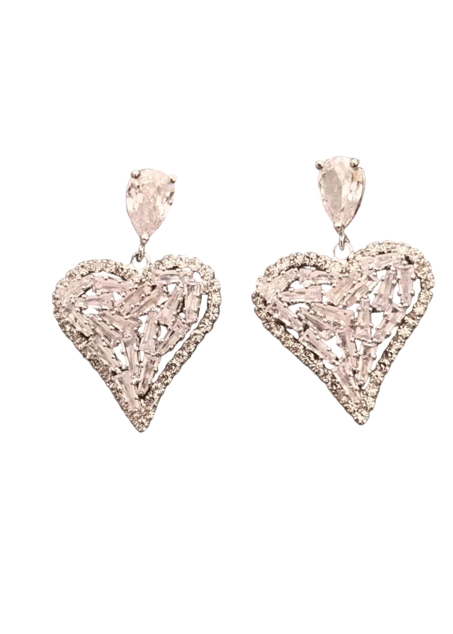 A pair of silver-toned filigree heart drop earrings with clear rhinestones.