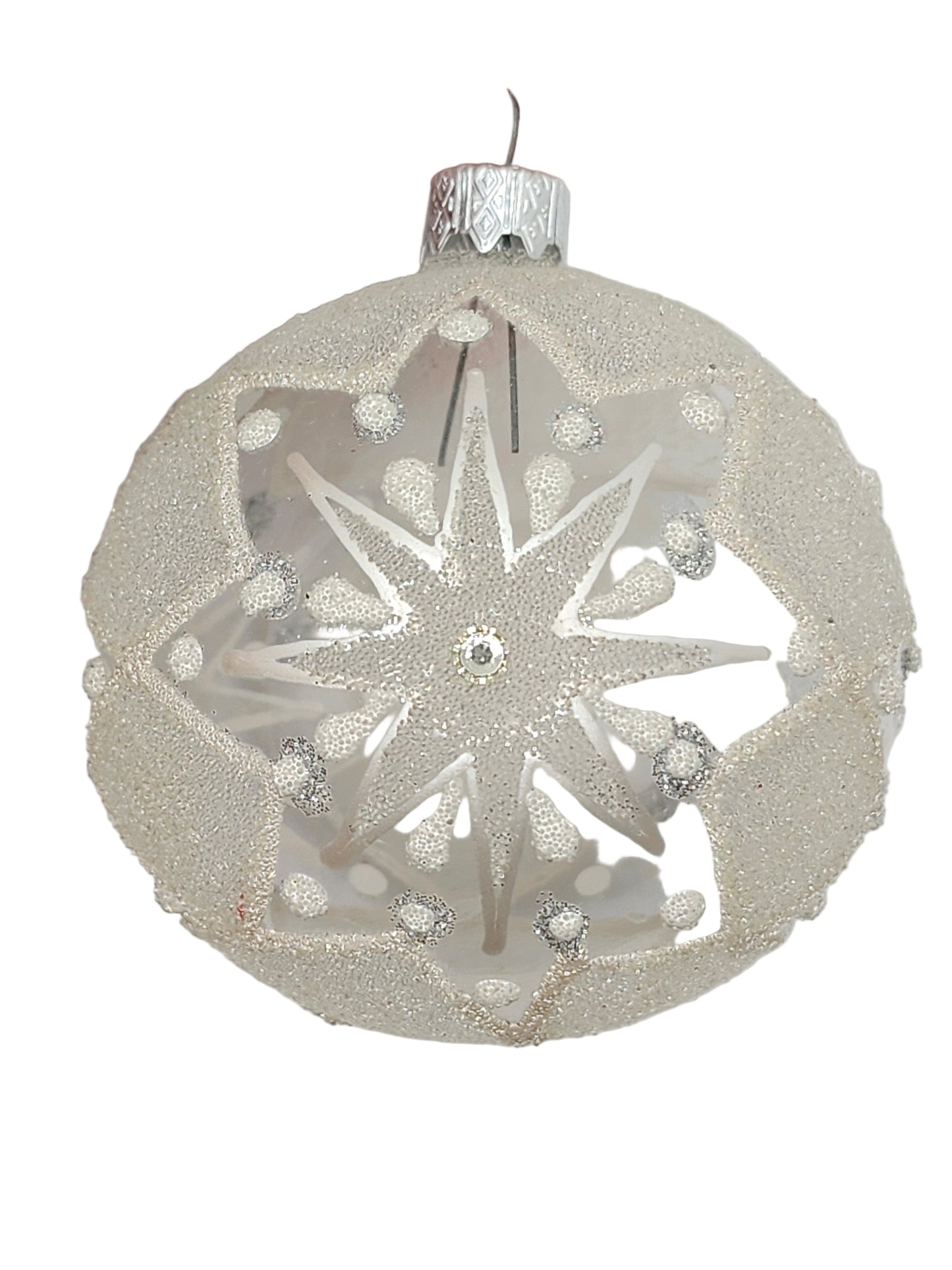 Silver Christmas ornament with snowflake design against a white background