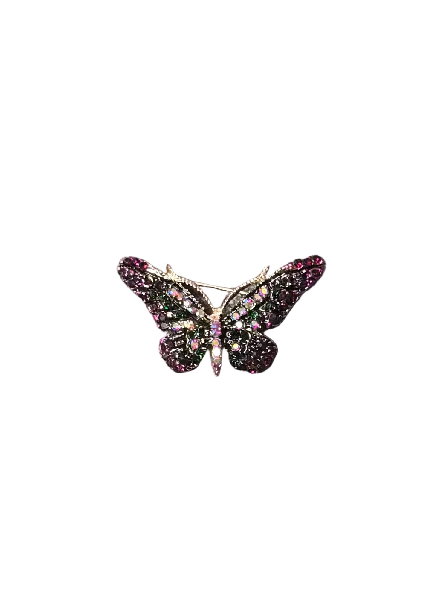 A butterfly-shaped brooch with dark purple and green rhinestones