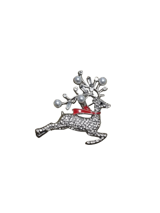 Decorative brooch with a red ribbon