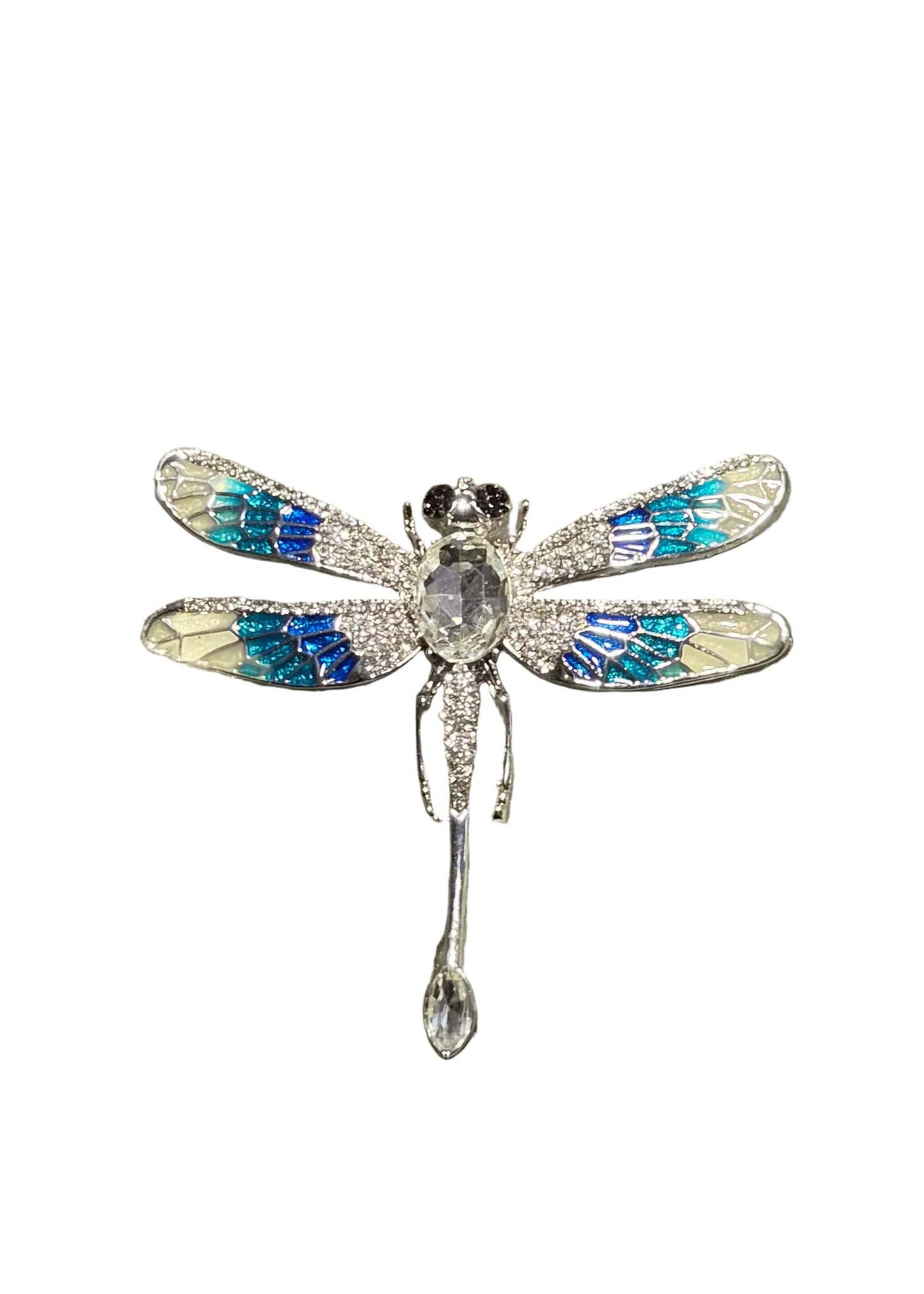 A dragonfly-shaped brooch with a silver-toned body, clear rhinestones, and vibrant blue, green, and gold enamel wings.