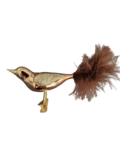 Colorful bird-shaped glass Christmas ornament on a clip