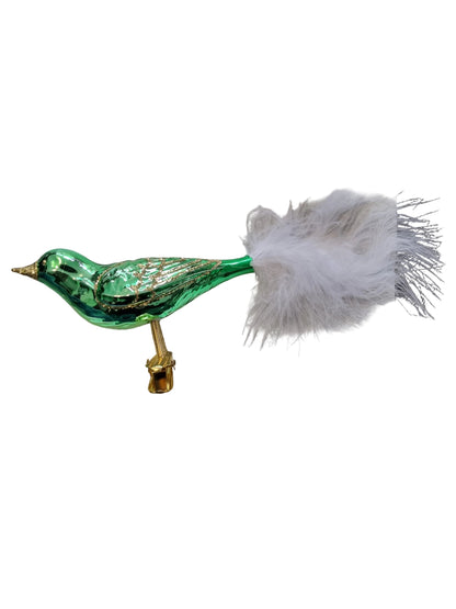Green feathered bird a gold clip