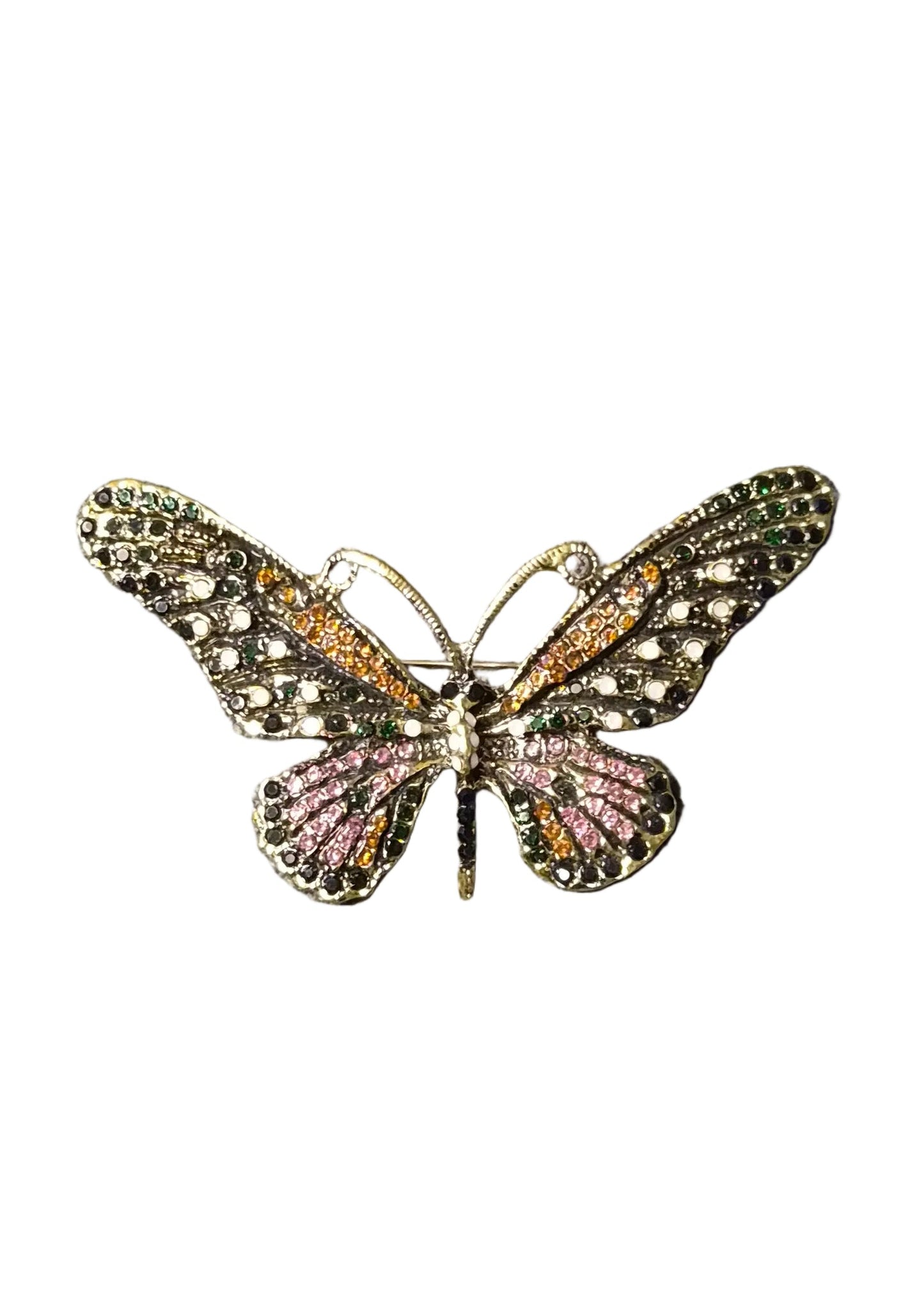 A butterfly-shaped brooch with intricate gold-toned metalwork, pink rhinestones on the lower wings, and green rhinestones on the upper wings