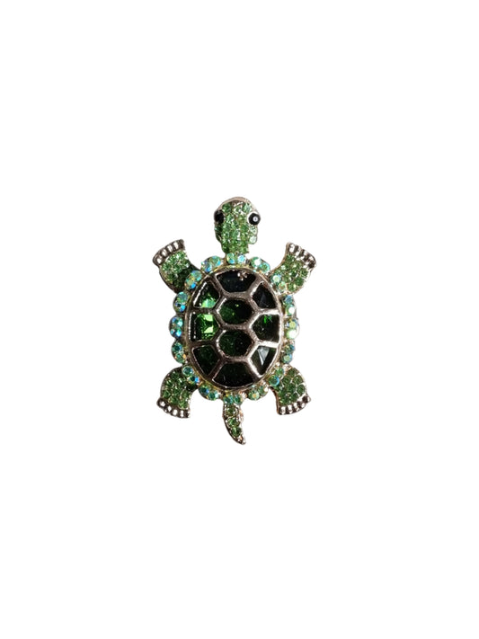 Tortoise-shaped brooch with green gemstones 