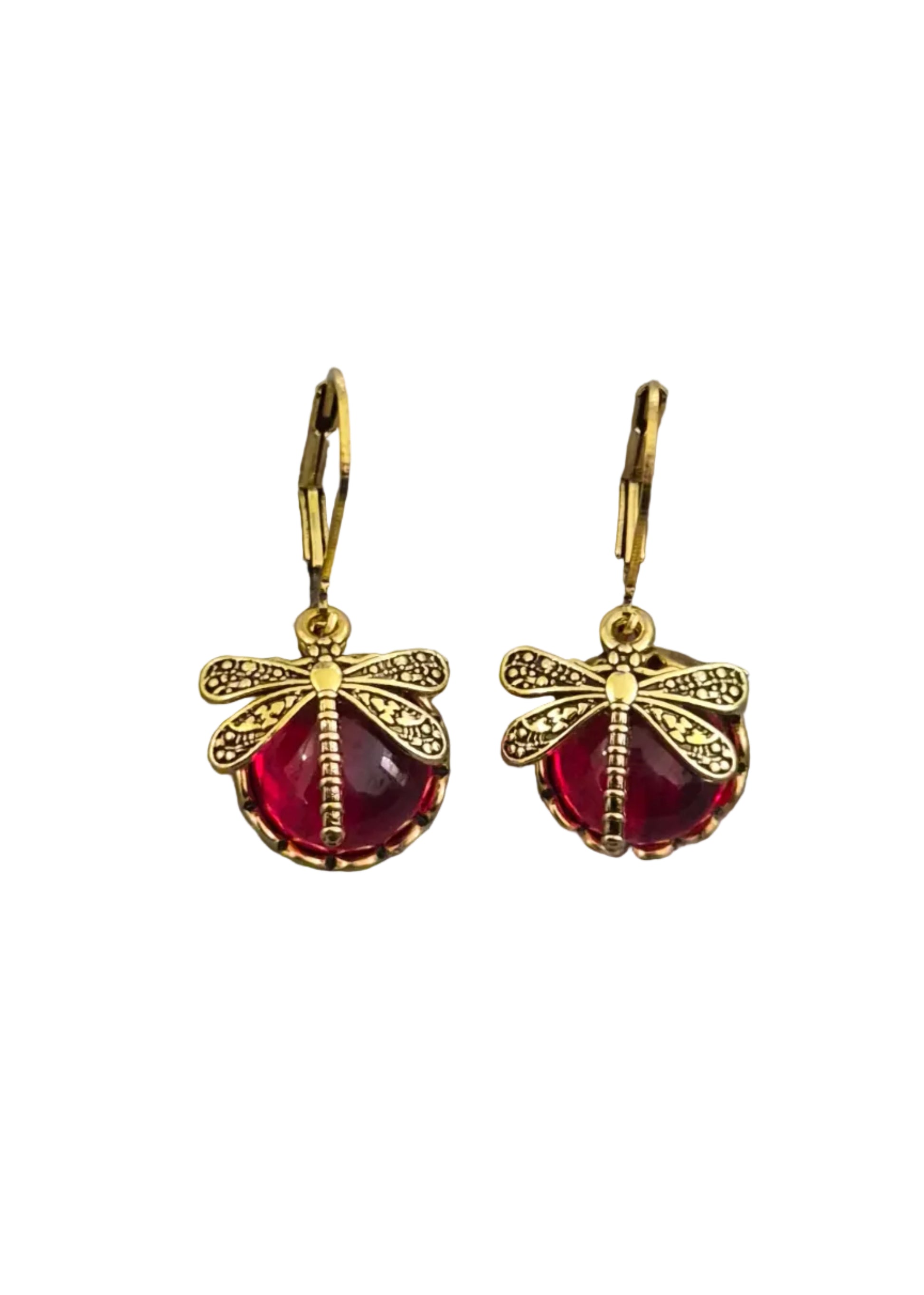A pair of gold dragonfly drop earrings with red faceted gemstones.