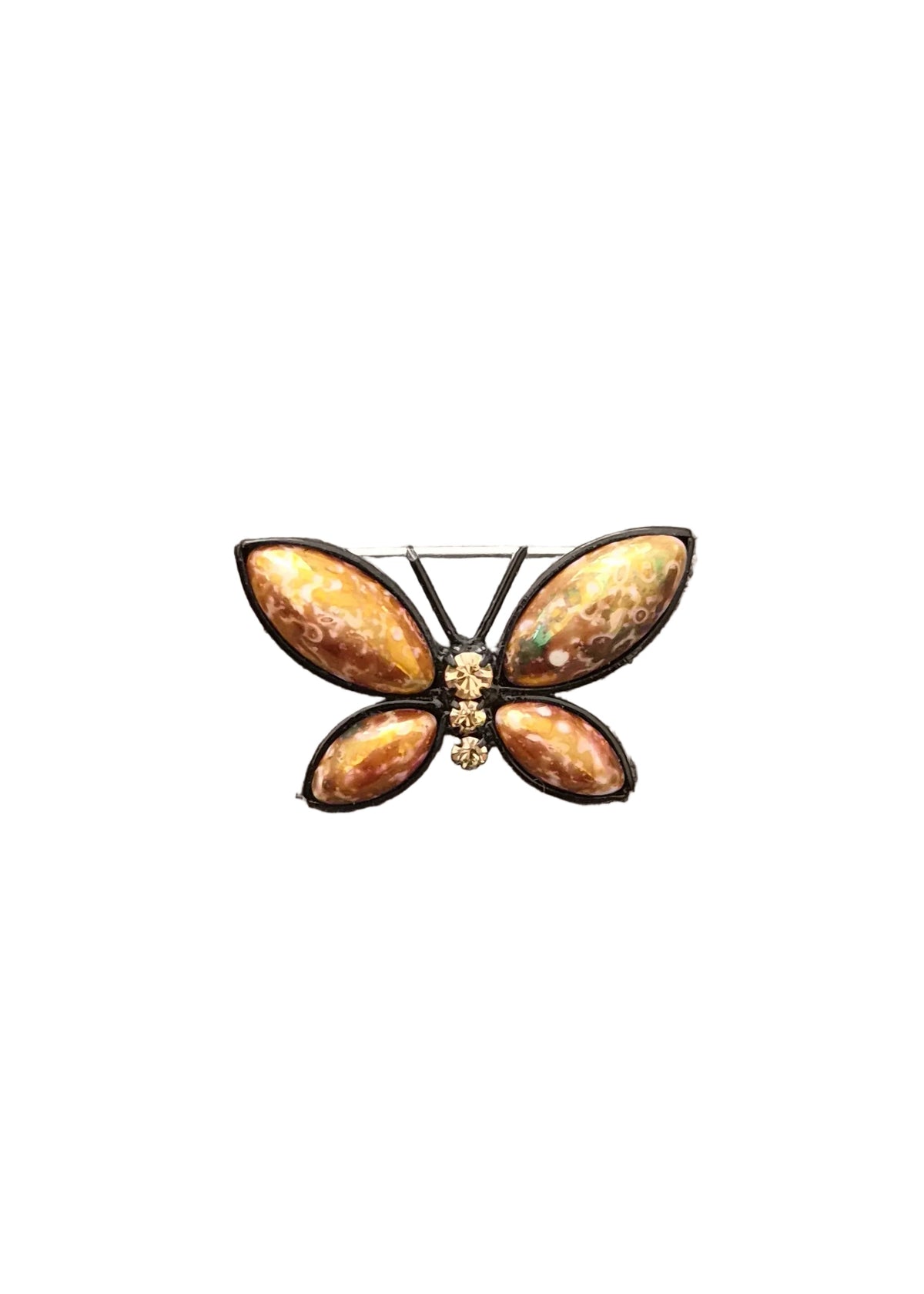 A butterfly-shaped brooch with four iridescent orange-brown wings and a small gold center.