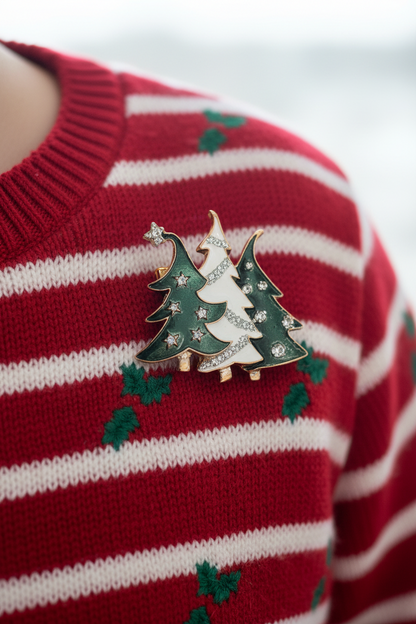 Red and white striped sweater with a Christmas tree brooch